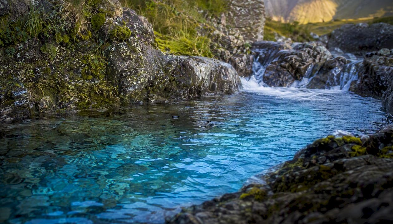 Turquoise water at Fairy Pools with small waterfall