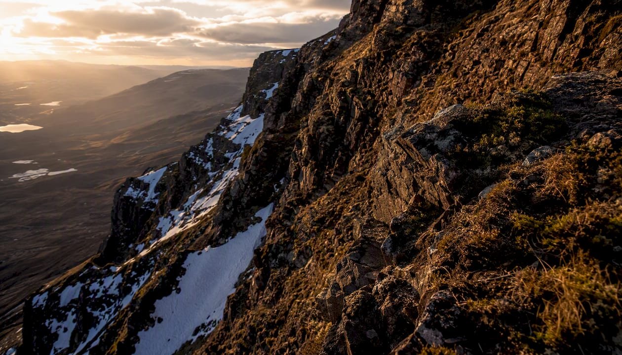 Steep rugged mountain ridges with snow-filled corries