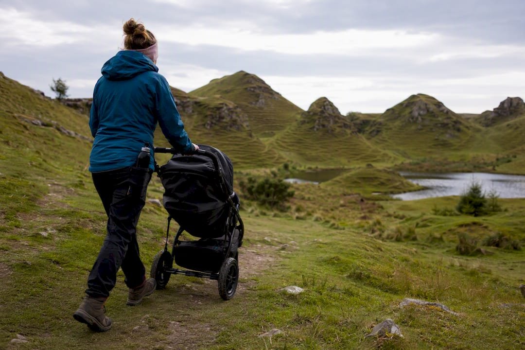 Visitor using pushchair in lower Fairy Glen